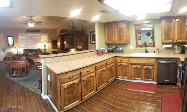 kitchen featuring sink, kitchen peninsula, ceiling fan, stainless steel dishwasher, and dark hardwood / wood-style floors