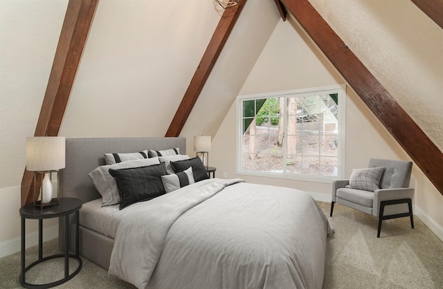 carpeted bedroom with vaulted ceiling