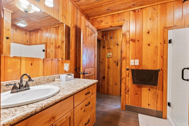 bathroom with wood ceiling, vanity, wooden walls, and hardwood / wood-style floors