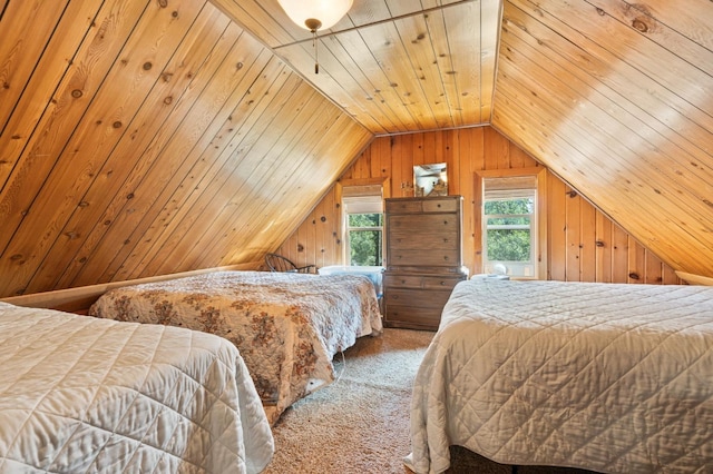 bedroom featuring lofted ceiling, wood ceiling, wood walls, and carpet