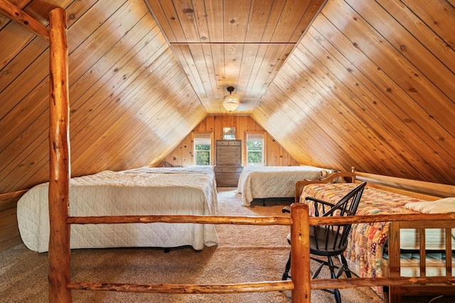 bedroom featuring wood ceiling, carpet floors, wood walls, and vaulted ceiling