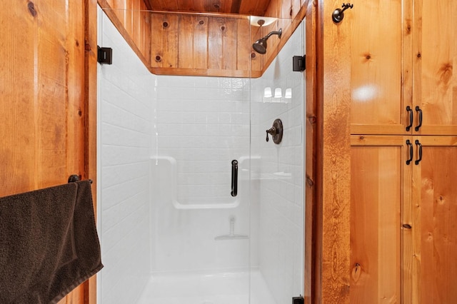 bathroom with an enclosed shower