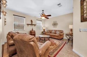 living room featuring ceiling fan