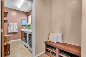 bathroom with washer and dryer