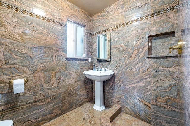 bathroom featuring tile patterned flooring