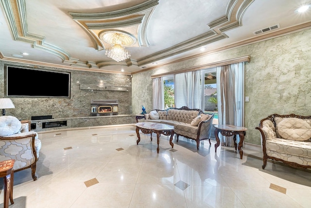 tiled living room with a tray ceiling, crown molding, and a chandelier