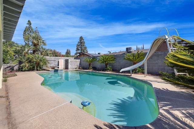 view of pool featuring a water slide