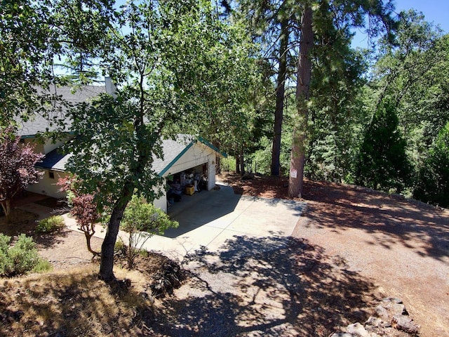view of side of property featuring a garage