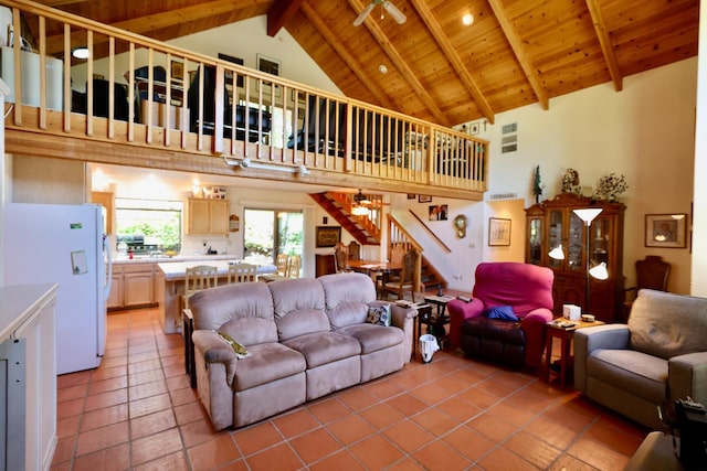 living room with tile patterned flooring, high vaulted ceiling, wooden ceiling, and beamed ceiling