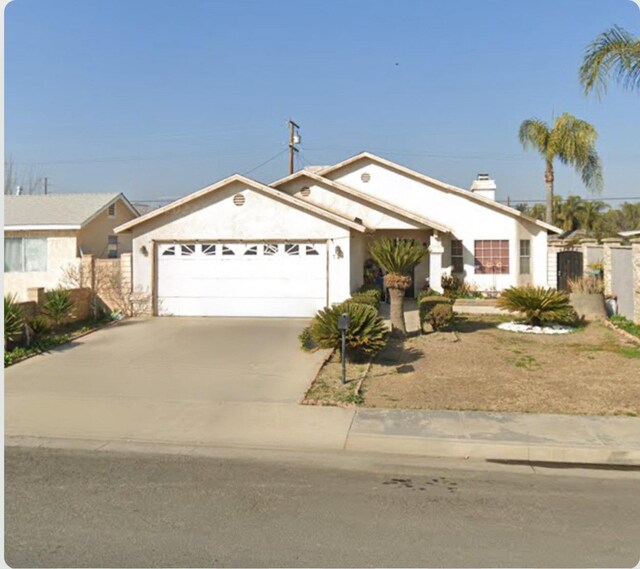 ranch-style home with a garage