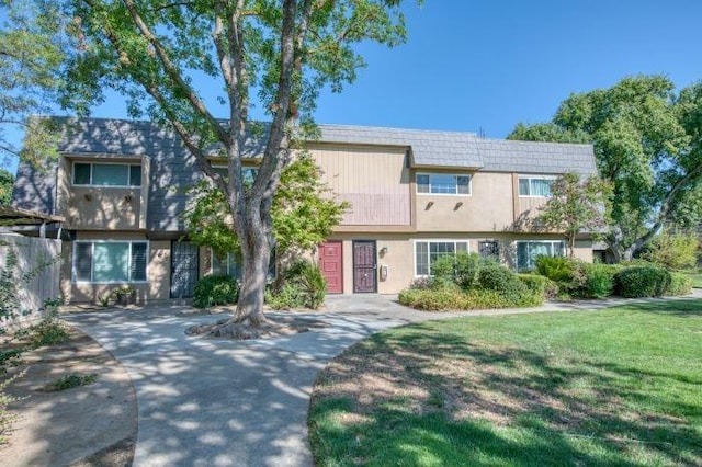 view of front of house with a front yard