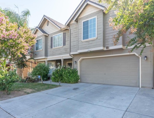 view of front of home with a garage