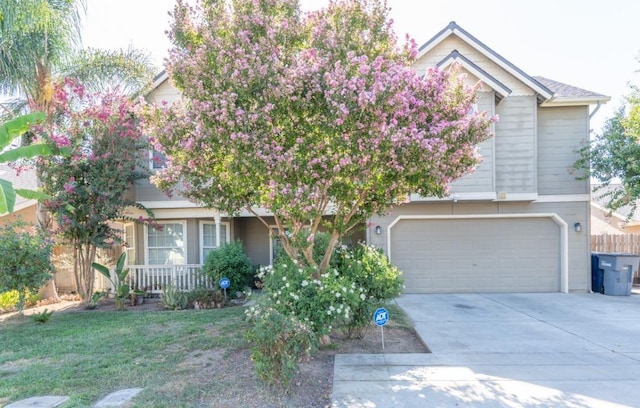 obstructed view of property featuring a garage