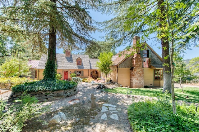 view of front of property with a chimney