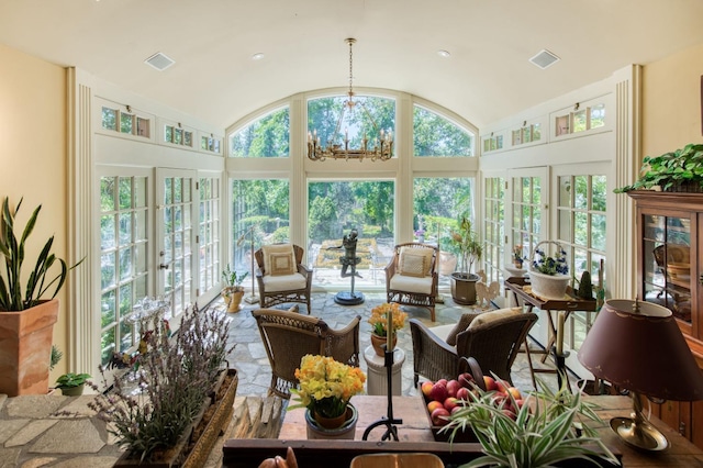 sunroom with vaulted ceiling and visible vents