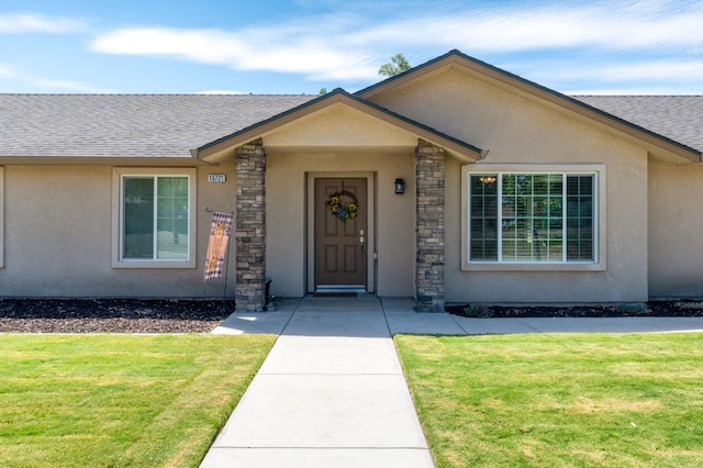 ranch-style house with a front yard