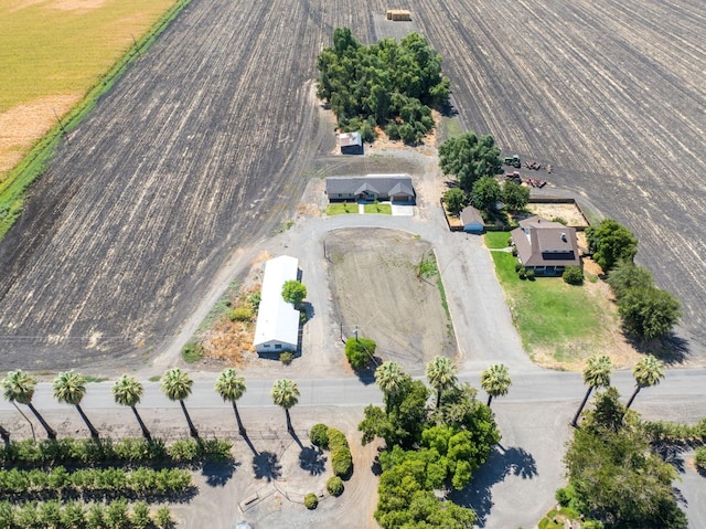 birds eye view of property featuring a rural view