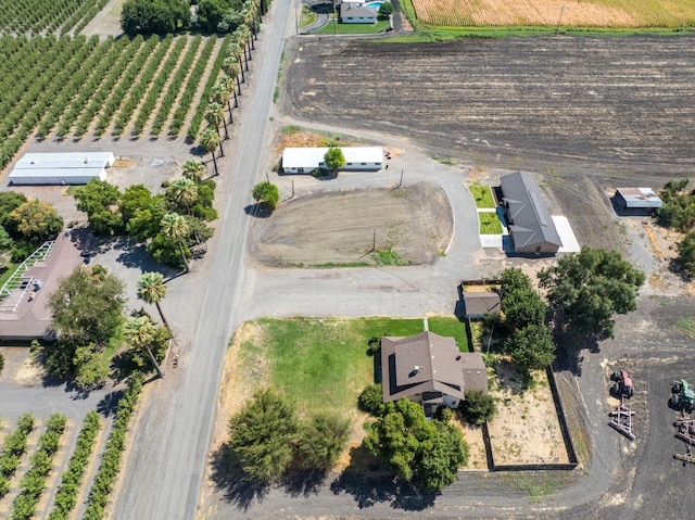 birds eye view of property featuring a rural view