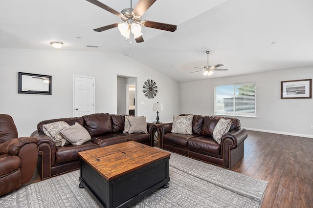 living room featuring hardwood / wood-style floors, vaulted ceiling, and ceiling fan