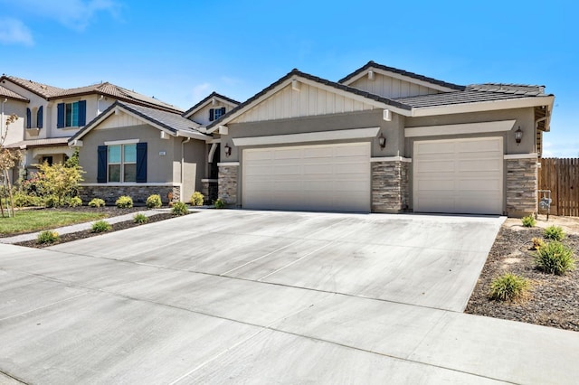 craftsman house with a garage