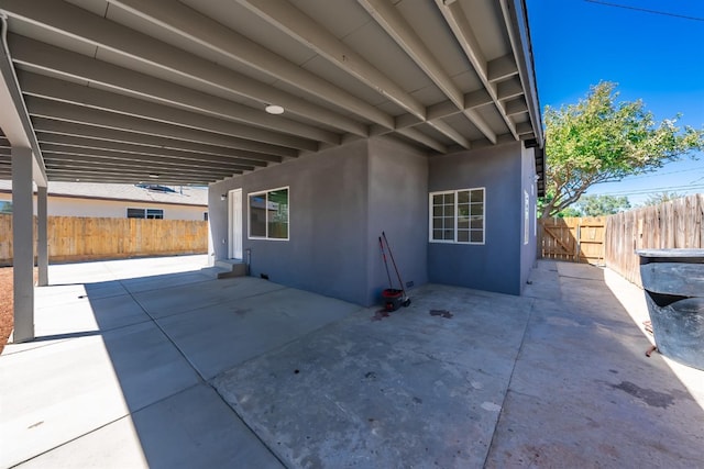 view of property exterior featuring a patio