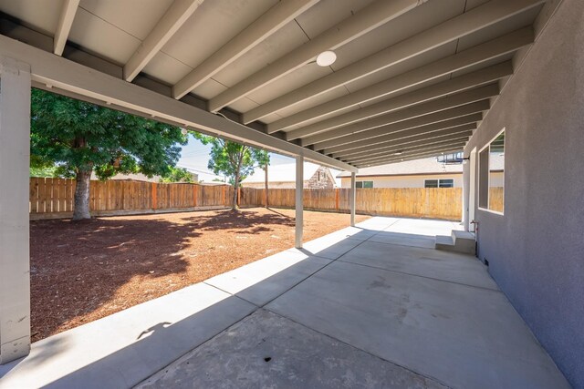 1845 N 10th Ave, Hanford, CA 93230 - fenced backyard with a patio