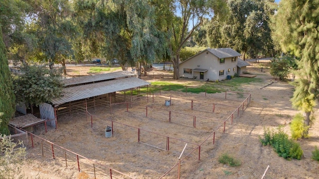 view of patio with an outbuilding