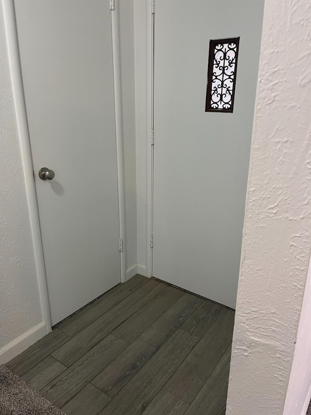 interior space featuring dark wood-type flooring