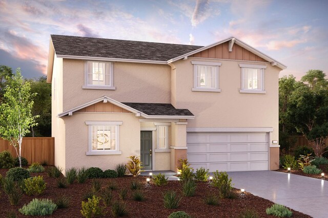 view of front of home with a garage