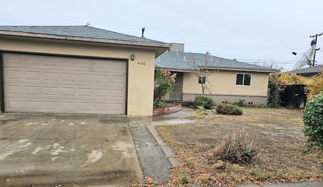 ranch-style house with a garage