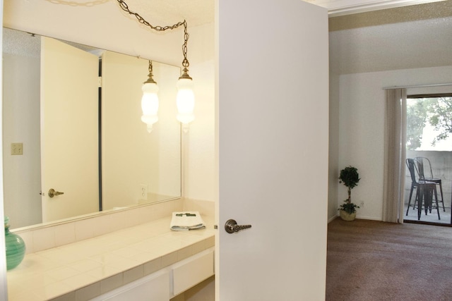 bathroom featuring a textured ceiling