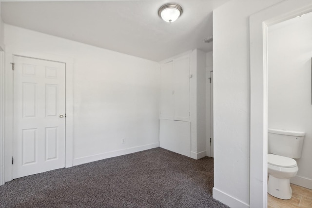 unfurnished bedroom featuring carpet floors