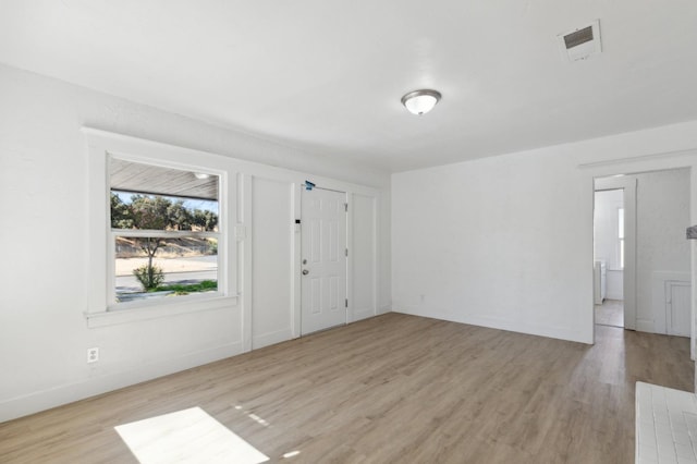 entrance foyer with light wood-type flooring