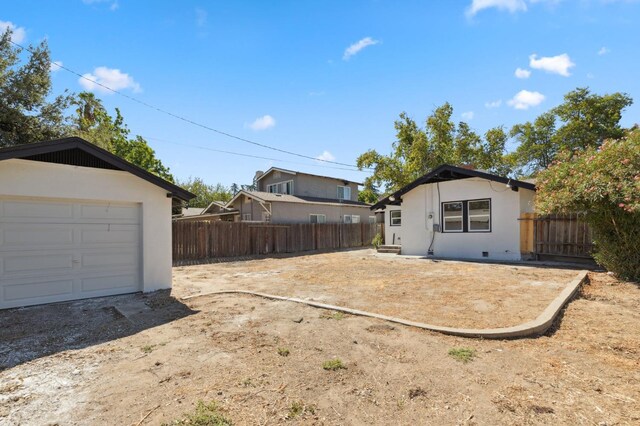 view of yard with a garage