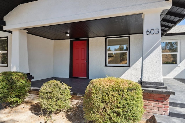 entrance to property with a porch