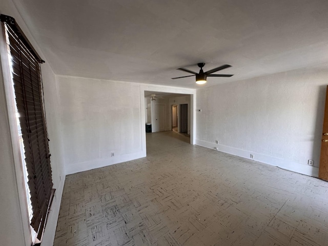 spare room featuring ceiling fan