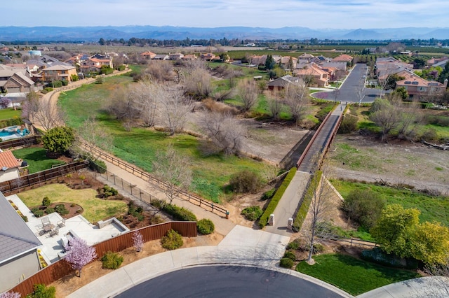 bird's eye view with a residential view and a mountain view