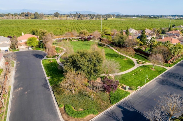 birds eye view of property featuring a rural view