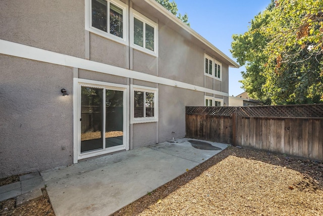 back of property with a patio area