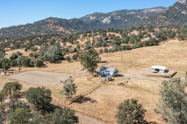 drone / aerial view with a mountain view and a rural view