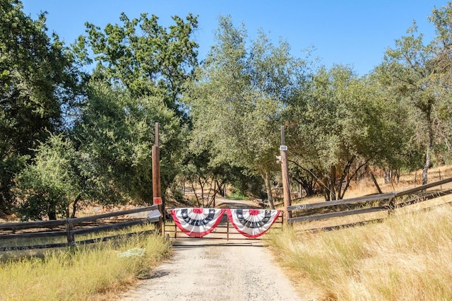 view of street featuring a gate