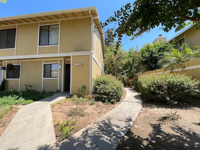 view of front of home featuring stucco siding