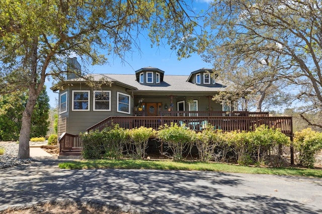 view of front of property with a deck