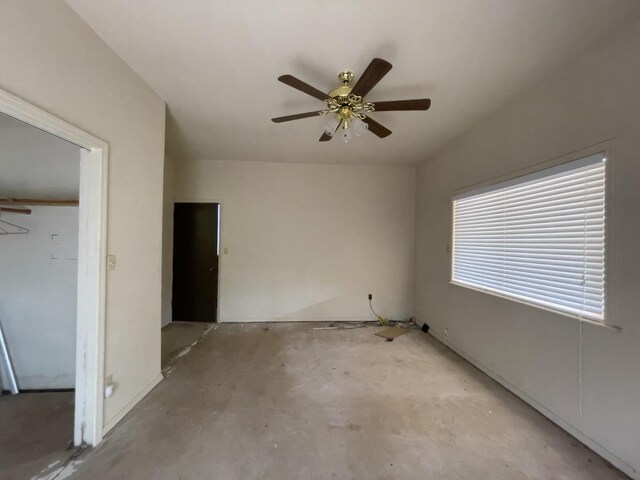 unfurnished room featuring ceiling fan