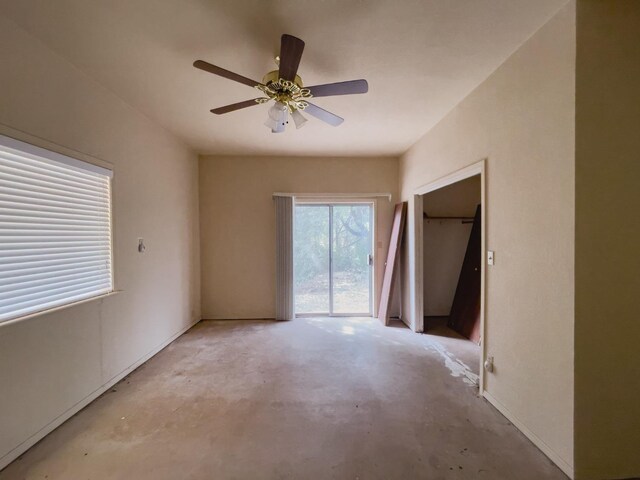 unfurnished room featuring ceiling fan