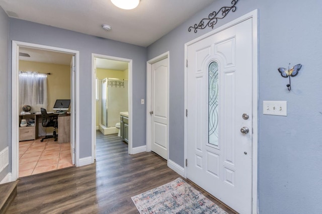 entryway featuring dark hardwood / wood-style flooring