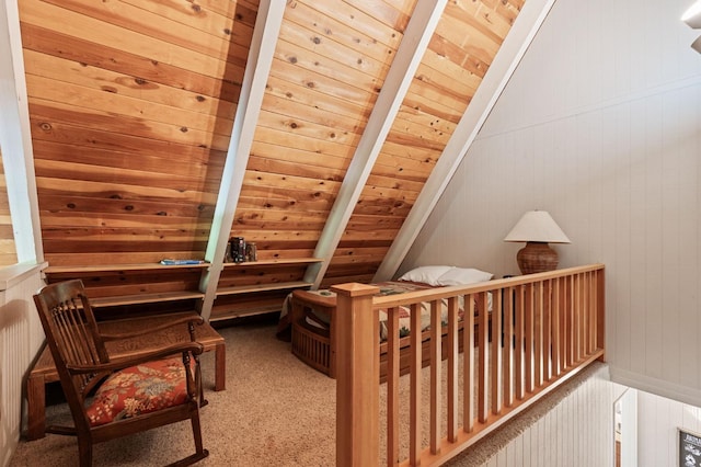 bonus room featuring vaulted ceiling, carpet floors, and wooden ceiling