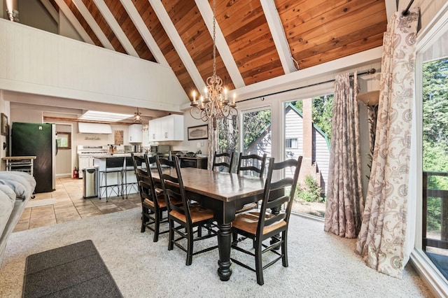 dining space featuring wood ceiling, high vaulted ceiling, ceiling fan with notable chandelier, light tile patterned floors, and beamed ceiling