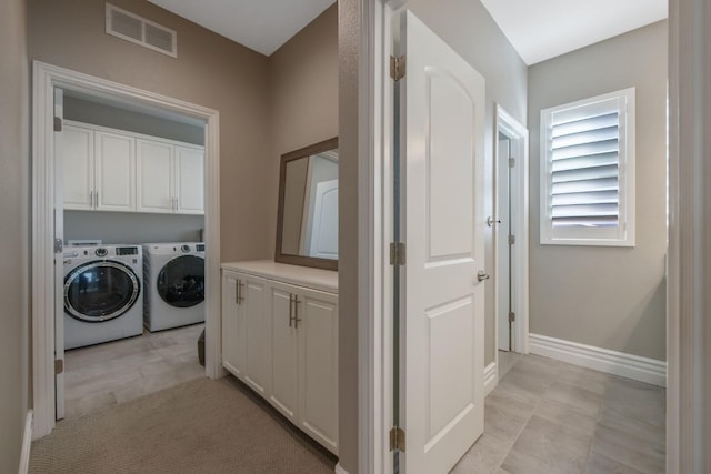 washroom featuring separate washer and dryer