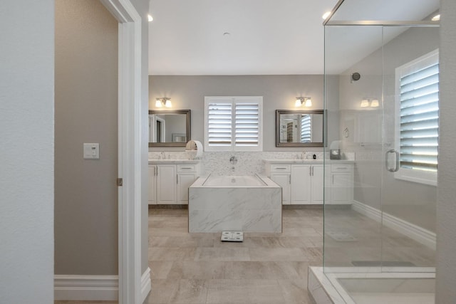 bathroom featuring vanity and plus walk in shower